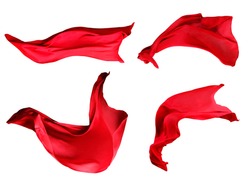 Red Fabric Cloth Flowing on Wind, Textile Wave Flying In Motion. Isolated on White background