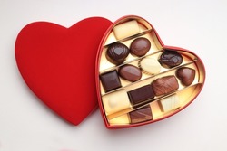 Luxurious valentine chocolates in a velvet, heart shaped gift box