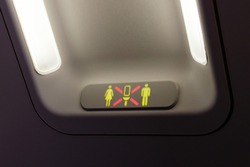 Occupied lavatory sign on the commercial airlines.