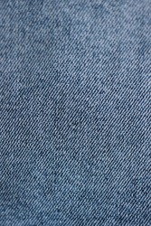 Blue Jeans Cloth Closeup Background. Denim. Casual Style Design Pattern.