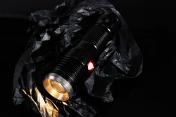 Portable lights for photographers, a device for illuminating objects and people, on a dark background