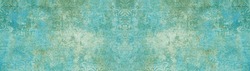 Old blue green vintage shabby patchwork damask ornate motif tiles stone concrete cement wall wallpaper texture background banner panorama long	
