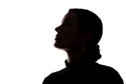 Portrait of a young woman looking up, side view - horizontal silhouette
