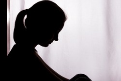 Silhouette of a young woman with problems - horizontal, isolated