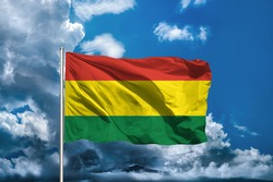 bolivian flag with sky background