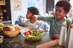 afro-american kids eating healthy food together. brother and sister. togetherness concept, sharing meal