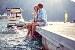 Lover happy couple hold together enjoying romantic beautiful lake