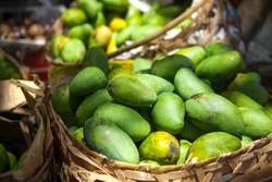 Green papaya on market