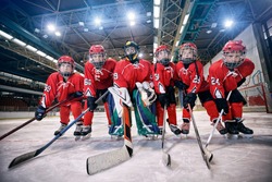 Youth hockey team - children play ice hockey