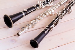 Musical background, poster - oboe, clarinet, flute, rose, symphony orchestra.