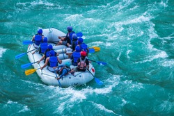 Raft in mid of River Ganges Rishikesh India.  White water  rafting water sports in Asia