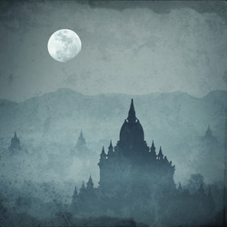 Amazing castle silhouette under moon at mysterious night. Fantasy grunge background in vintage style