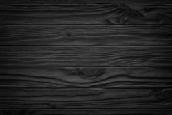 Black wooden plank, tabletop, floor surface or chopping, dark wood texture
