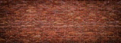 brick wall of red color, wide panorama of masonry