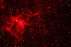 Red galaxy in deep space. Elements of this image were furnished by NASA.. High quality photo