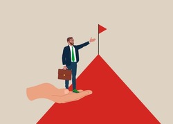 Businessman stand on giant helping hand to reach mountain peak target flag. Сoaching or mentor support employee to achieve business target, advantage to reach goal and inspiration.