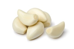 Fresh whole peeled garlic gloves isolated on white background