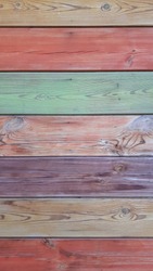 Colorful wooden wall close up