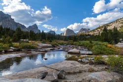 The East Fork River in the Wind River Range of Wyoming. Left to right, Ambush Peak, Raid Peak and Midsummer Dome are seen to the north.