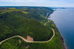 Aerial view of the winding Cabot Trail road seen from high above on the Skyline Trail in Cape Breton Island, Nova Scotia