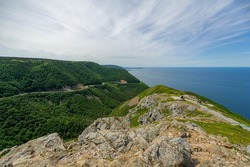 The winding Cabot Trail road seen from high above on the Skyline Trail in Cape Breton Highlands National Park, Nova Scotia