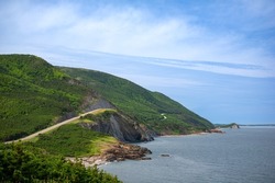 Scenic view of Cabot Trail in Cape Breton Island, Nova Scotia, Canada on a sunny summer day