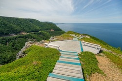 The Skyline Trail in Cape Breton Highlands National Park, Nova Scotia. The winding Cabot Trail road is visible in backgtound