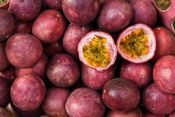 close up of fresh purple passion fruits harvest from farm