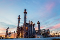 Oil petrochemical refinery plant with sunset