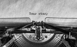 your story typed words on a Vintage Typewriter. Mechanisms closeup. Typing on old typewriter