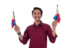 asian young male with smile holding philipines flag on isolated background