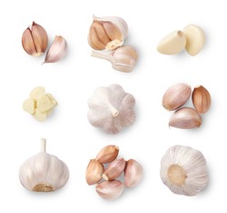 A set of garlic, cloves and slices isplated on white background. Top view.