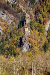 Cliff ruins Innerjuvalt - an old fort on the deep mountain over the Swiss village Rothenbrunnen in Canton Graeubinden, Switzerland
