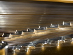 Interior of a concert grand piano - shallow depth of field
