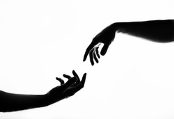 Finger Touching hands silhouette man woman white background couple feeling love. Black and white photo picture. Hands. Shadow. Black and white photo. Life. Love. 
