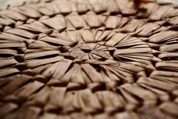 Wicker placemat detail, Basketwork vine brown circle texture background, abstract weave, up close texture