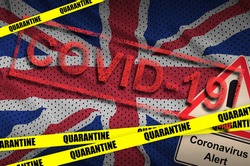 Great britain flag and Covid-19 quarantine yellow tape with red stamp. Coronavirus or 2019-nCov virus