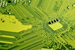 Close up of colored micro circuit board. Abstract technology background. Computer mechanism in details