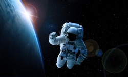 ASTRONAUT IN SPACE. Elements of this image furnished by NASA 
