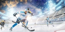 Sports emotions. Hockey action. Fight for the puck. Concept of action, team sport game, energy, ad