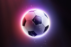 Soccer ball floating in space on an abstract background