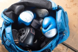 Boxer sports bag. Boxing ammunition in a bag. Boxing gloves and protection. Top.