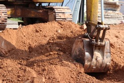 Loader backhoe,excavator digging a trench,Work of excavating machine on building construction site