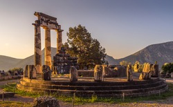 Tholos with Doric columns at the sanctuary of Athena Pronoia temple ruins in ancient Delphi, Greece
