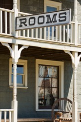 Sign for available rooms in the old western hotel, Western USA
