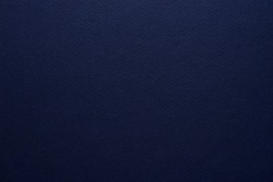 Paper texture background. High quality Grain texture in a high resolution. Dark blue color. Fine arts paper.