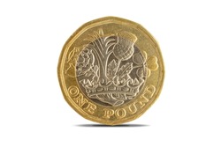 A close-up shot of the British one pound coin over a white background.