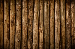 A log wall. Wooden wall from old logs