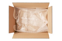 An open cardboard box with bubble wrap. The concept of packaging parcels with fragile cargo. Isolated on white