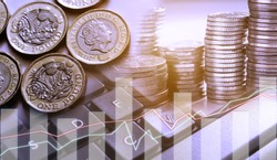 Double exposure of graph and row of coins and new pound couins for finance and banking concept